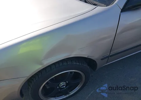 2000 Toyota Corolla Ce from USA, damaged, VIN 1NXBR12E5YZ337356